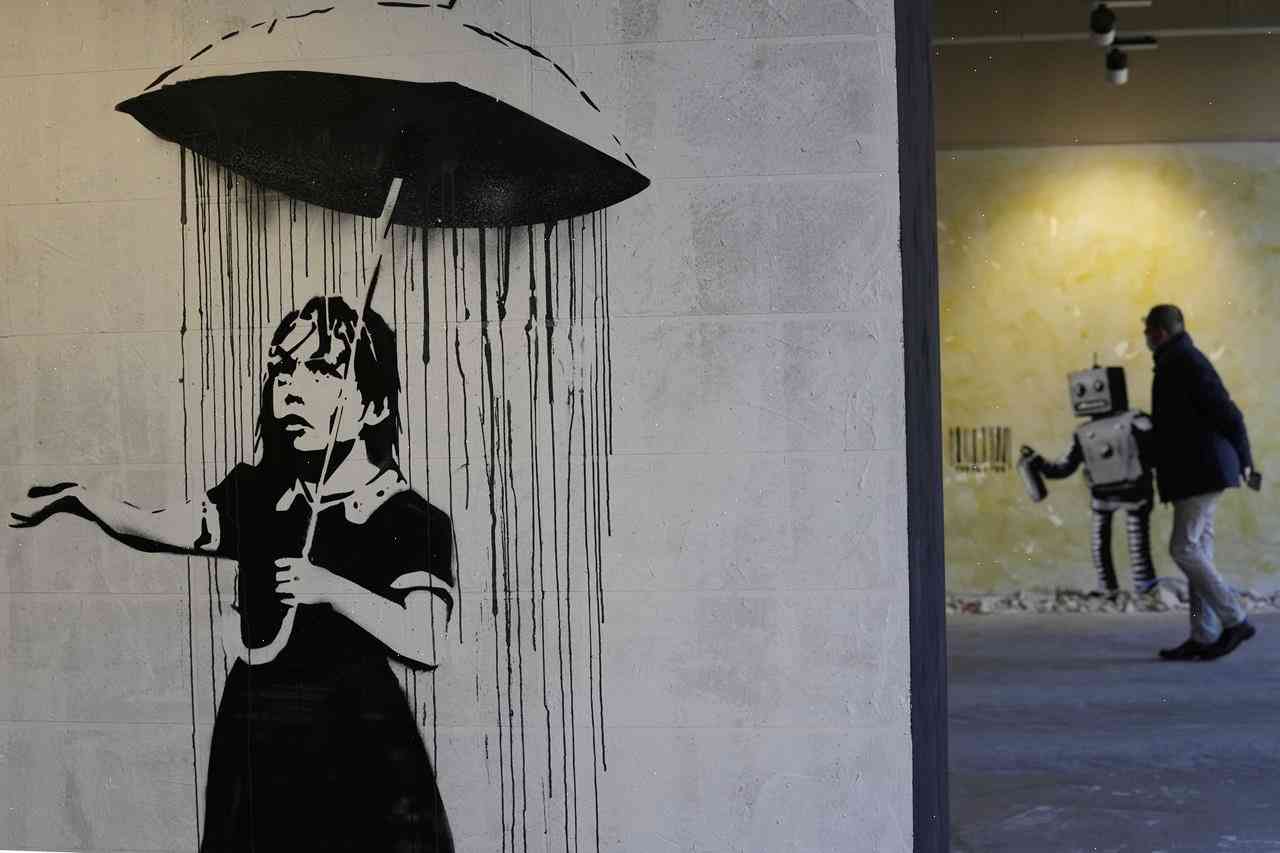 Banksy artwork re-creates ‘Dismaland’ tour for an underground train station in Milan